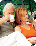 Couple relaxing with coffee